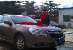 超前涂料獎勵員工轎車，真石漆生產(chǎn)廠家！